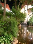 The mall was lush with greenery and running water.