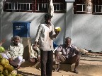 Getting fresh coconut milk for breakfast.