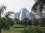 Built (1980-1986) to resemble a lotus flower, it is set among 9 pools of water, and surrounded by gardens.
