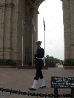 The guard ensures the eternal flame for the Unknown Soldier is honored.