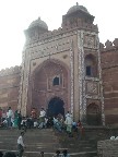 This is said to mimic the mosque at Mecca. A Qoranic inscription reads: "The world is a bridge, pass over it but build no house upon it. He who hopes for an hour may hope for an eternity."
