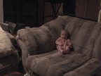 little girl on big chair