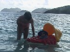 isa rides the waves